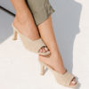 Leather quilted mules in sand suede