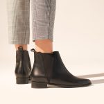 Chelsea leather flat boots in black