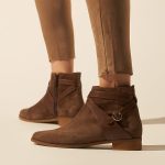 Flat ankle leather boots in brown suede