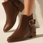 Flat ankle leather boots in brown