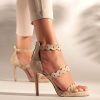 Heeled leather sandals in sand