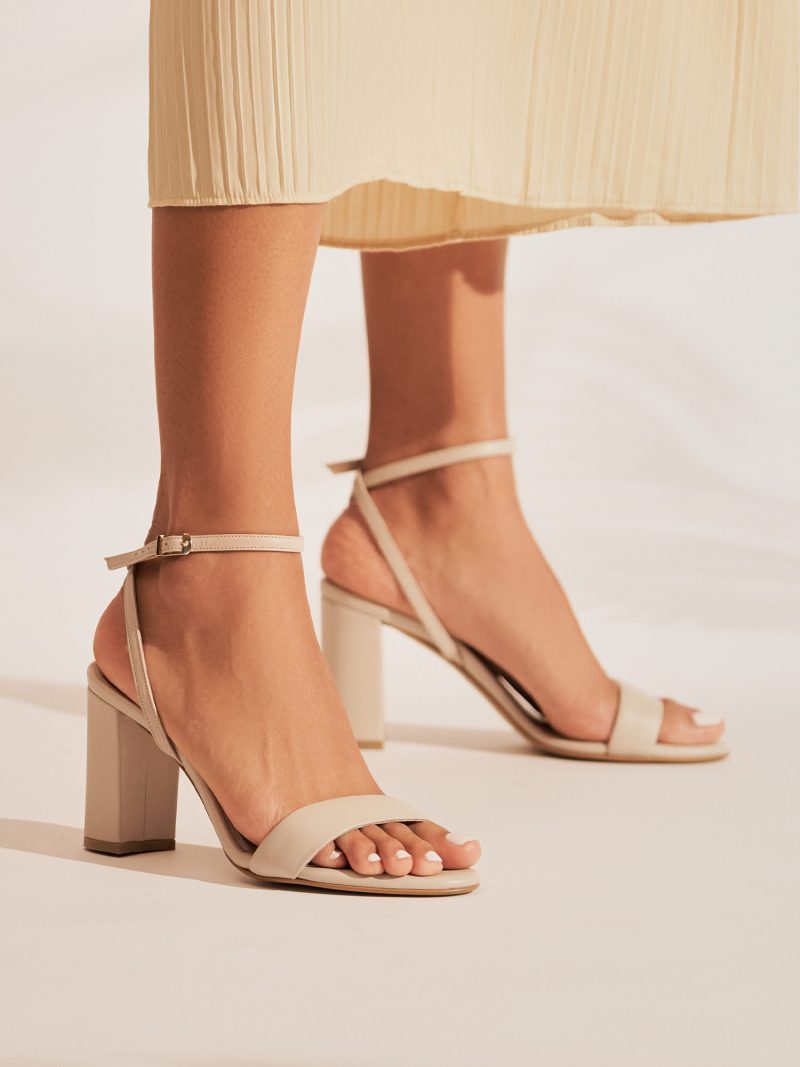 Heeled leather sandals in sand