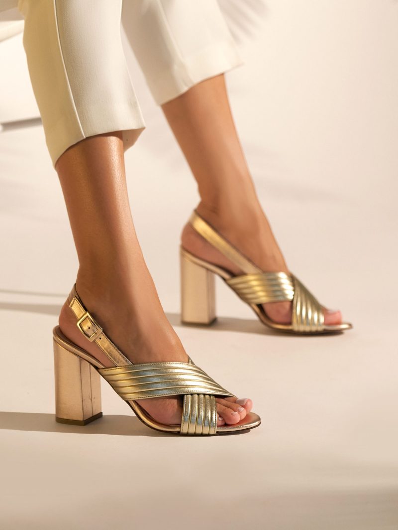 Block heel leather sandals in gold