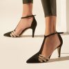 Heeled leather pumps in olive suede