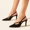 Heeled leather slingback pumps in black suede