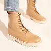 Combat leather boots in beige leather