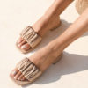 Flat leather sandals in sand