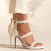 Heeled leather sandals in white