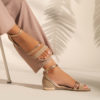 Flat leather sandals in sand and gold