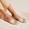Flat leather sandals in sand
