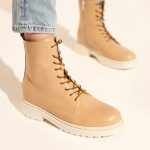 Combat leather boots in beige leather
