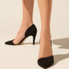 Heeled leather pumps in black suede